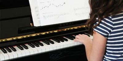 Child playing piano